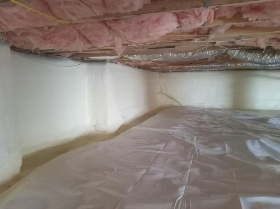 Crawl space encapsulation with closed-cell spray foam for Storm Damage Roof Repair in Superior